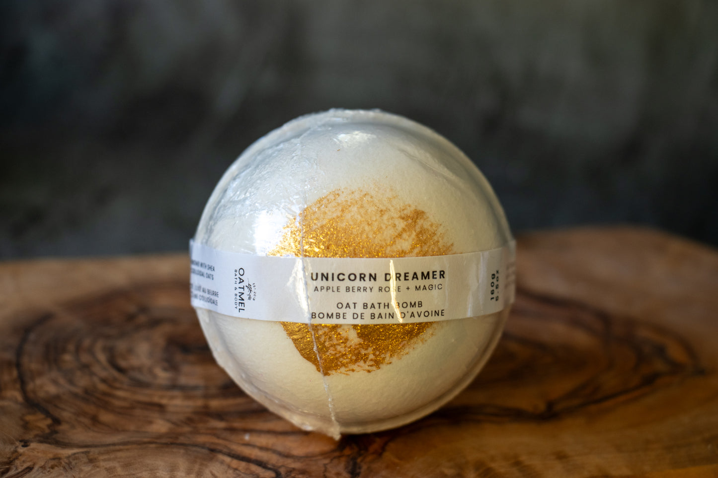 white bath bomb with gold brush stroke