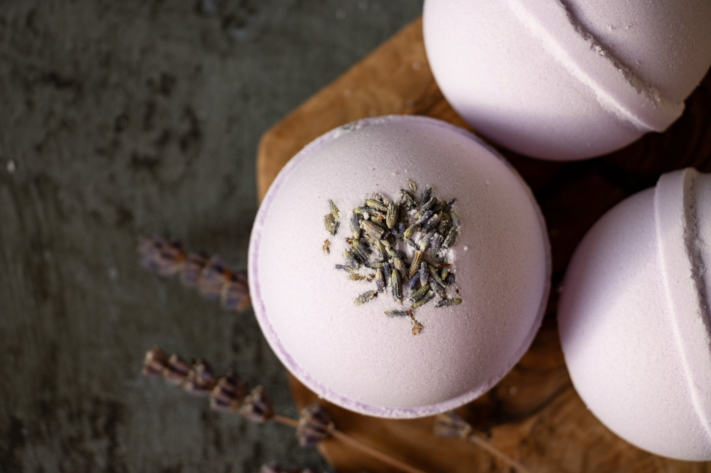 purple bath bomb with lavender buds