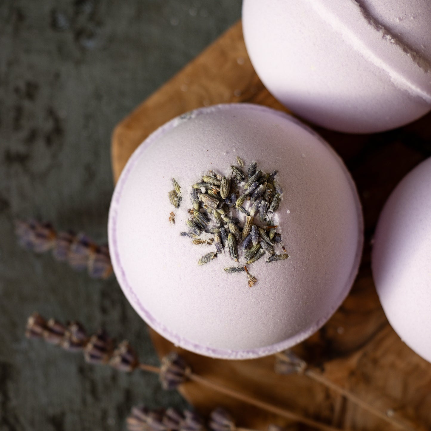 purple bath bomb with lavender buds