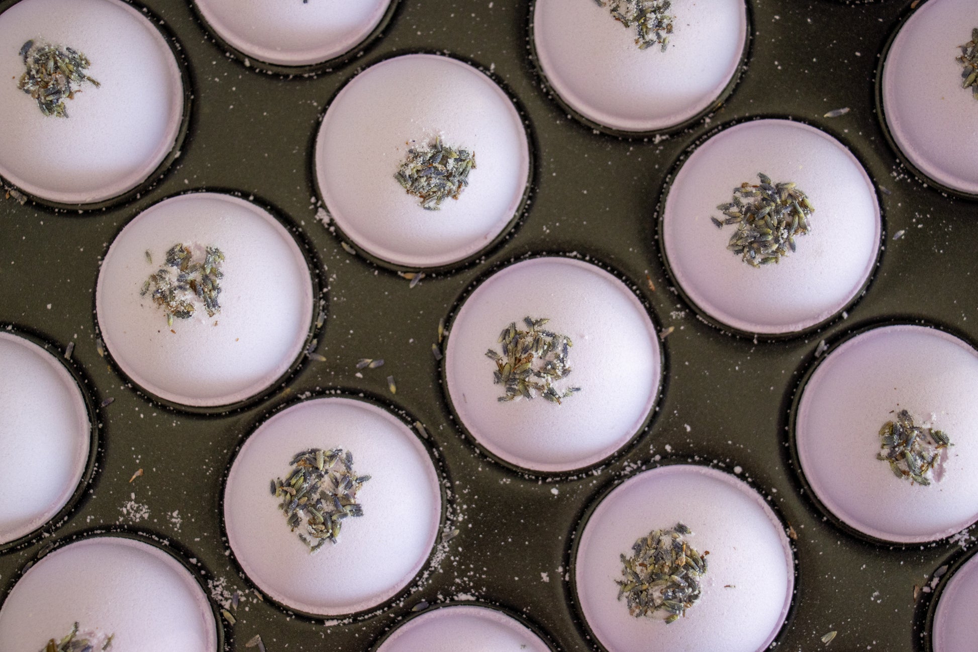 purple bath bomb with lavender buds