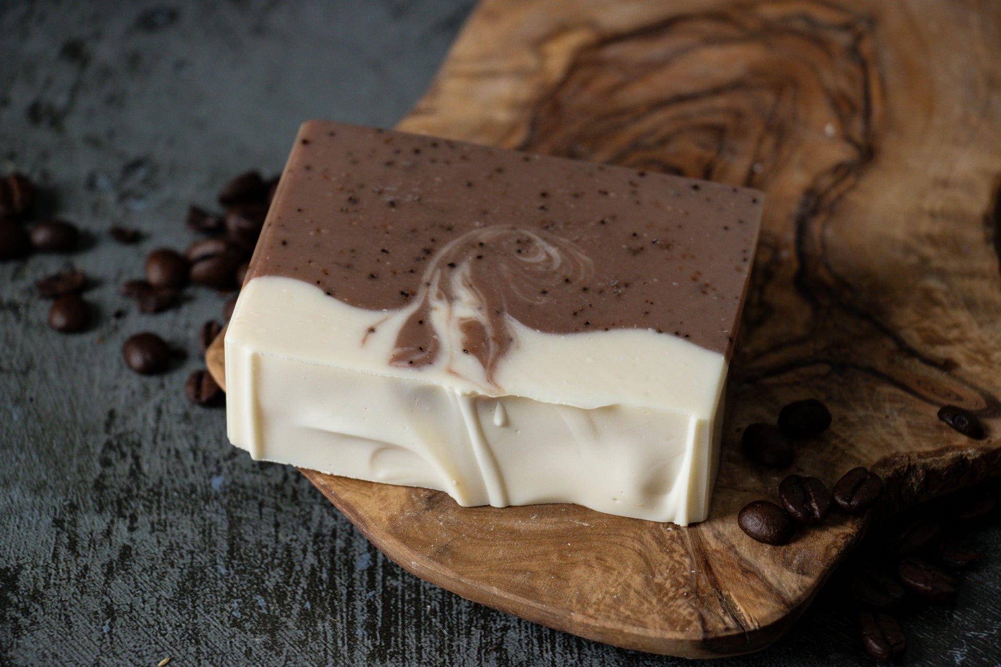 Oat milk bar soap with coffee grounds brown and white